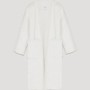 Cardigan long en maille avec sur-poches en fourrure de vison